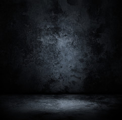 Grunge interior with concrete wall