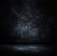 Grunge interior with concrete wall