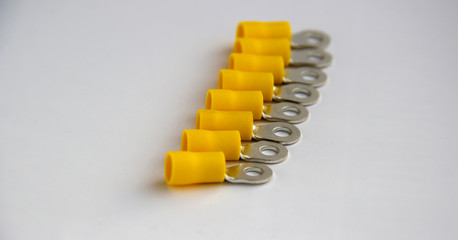 electrical crimp terminal connector. metal terminals isolated on white background. tips for cables and wires.