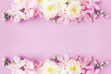 Naklejka na ściany i meble beautiful mix flowers frame on soft pink romance background
