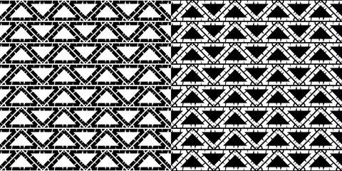 A set of 2 images. Black and white seamless background. Design with manual hatching. Ethnic boho ornament. Seamless background. Tribal motif. Vector illustration for web design or print.