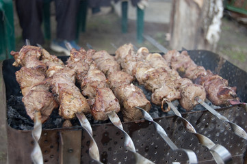 meat pork and beef skewers on the grill