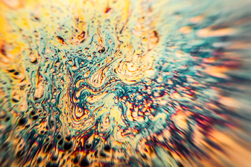 Soap bubbles taken in a black coffee mug. The microscopic look of the bubbles is achieved by using...