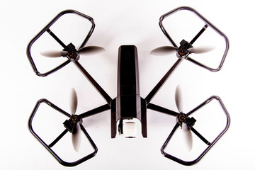 Quadrocopter, Photographer, video drone for 4K HDR recordings. Photographed in a studio on a white background.