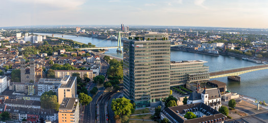 Naklejka premium modern building and severins bridge on a warm summer day in cologne