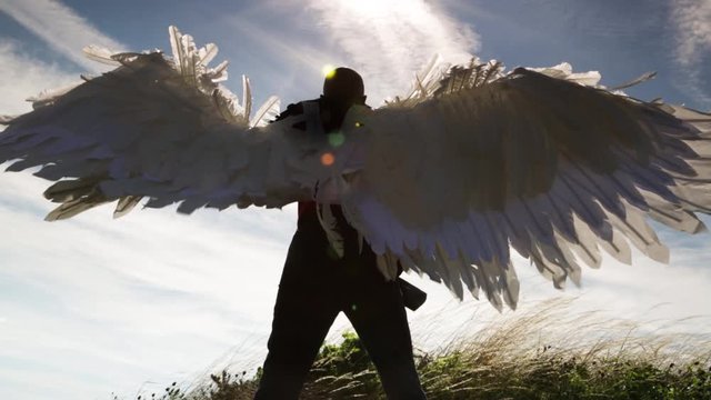 Close up from behind, Bird Man displays wings