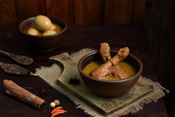 chicken curry is Indonesian traditional dish of chicken cooked in a spicy, rich, yellowish, curry-like sauce called gulai