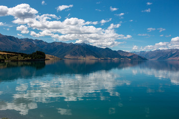 Reflection of lake Hawea in South island, New Zealand