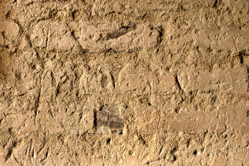 Traces sur le pisé de la ferme de la Forêt à Courtes, France
