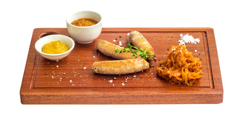 Bavarian sausages on wooden desk,  isolated on white,  food menu 
