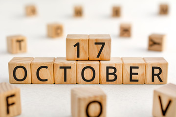 October 17 - from wooden blocks with letters, important date concept, white background random...