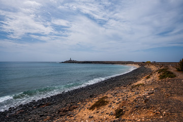 Fuerteventura: view of Punta Jandia Lighthouse in october, 2019. Opened in 1864, Punta Jandia Lighthouse is at the extreme southern cape of the island, in the Jandia natural park