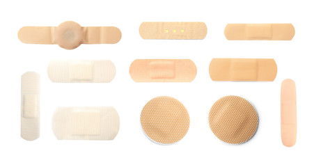 Set with sticking plasters on white background, top view. Banner design