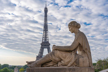 Fototapeta na wymiar Paris, France - 05 06 2020: Statue of a sitted woman on the Trocadero esplanade during the coronavirus period