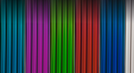 abstract multi colored unfocused stripes blue purple green and red colors fuzzy surface background