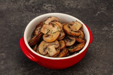 Roasted champignon with herbs and spices