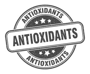 antioxidants stamp. antioxidants round grunge sign. label