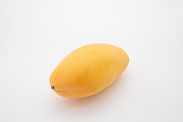 Close up one ripe yellow mango popular of fruit slices product isolated mockup on white background concept for summer tropical juice taste breakfast image. Eating fresh healthy organic food.