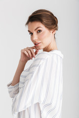 Image of charming caucasian woman posing and looking at camera