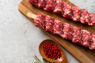 Raw turkish traditional meat kebab on the table. Close up.