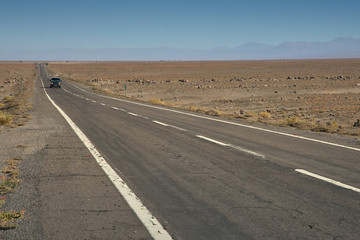 Truck passing on the way to Miscanti Lagoon. Flamingos National Reserve Conaf. San Pedro de Atacama, Antofagasta - Chile. Desert. Andes Range & Route 23.