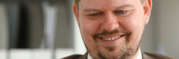 Handsome smiling businessman talk cellphone