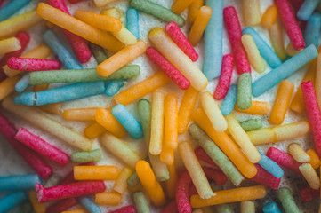 Confectionery multi-colored decorative topping on the glaze of Easter baking.