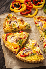 Homemade quiche with vegetables and cheese, vegetarian food.