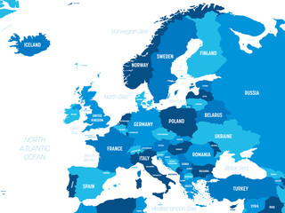 Europe map - green hue colored on dark background. High detailed political map of european continent with country, capital, ocean and sea names labeling © pyty