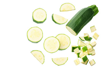 fresh green zucchini with slices isolated on white background. top view