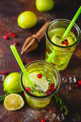 Lime Lemonade with thyme, cranberry and ice.