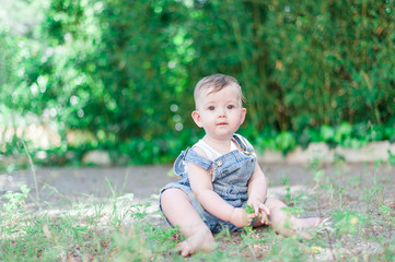 Baby girl playing outdoors