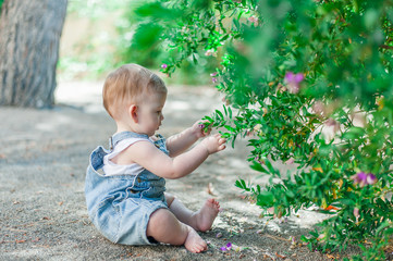 Baby girl playing outdoors