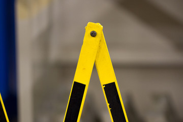 yellow caution sign