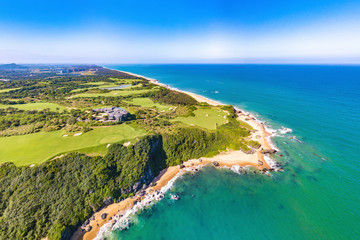 Shanqin Bay, Wanning County, Hainan Island, a Seaside Golf Course Built on a Rolling Land that Overlooks the South China Sea. Aerial View.