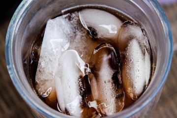 Glass of fresh coke with ice