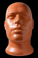 Mannequin head. Brown mannequin head portrait. Isolate on a black background.