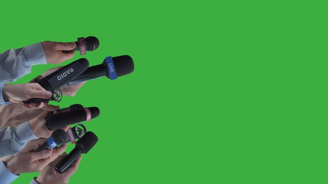 Many live reporter hands with mic,broadcasting for tv,radio and internet