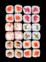 Sushi and rolls pattern background, sushi rolls texture top view