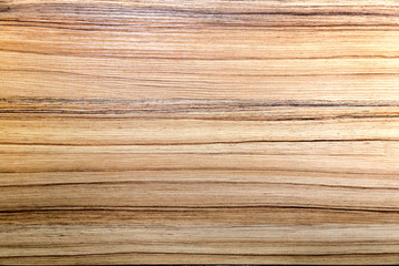 Wood texture. Wood texture for design and decoration. The color is orange-beige with a thin brown stripe. Fine texture, pattern. Natural wood background.