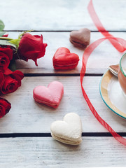Sweet loved macaroons heart and coffee
