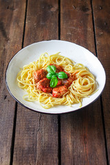 pasta spaghetti meatballs and tomato sauce Menu concept healthy eating. food background top view copy space for text