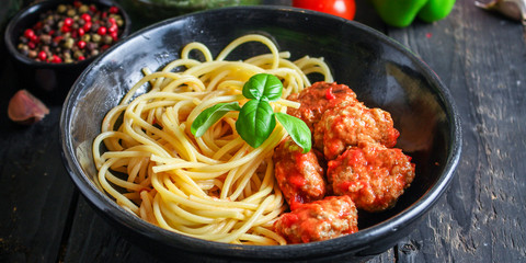 pasta spaghetti meatballs and tomato sauce Menu concept healthy eating. food background top view copy space for text