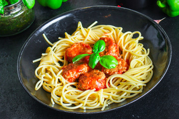 pasta spaghetti meatballs and tomato sauce Menu concept healthy eating. food background top view copy space for text