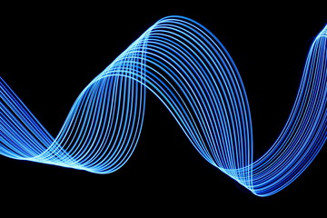 Long exposure photograph of neon electric blue colour in an abstract swirl, parallel lines pattern...