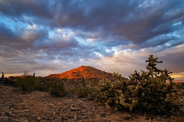 Stormy Sunset, beautiful sky, last light on the hill top, Arid desert in South mountain, Phoenix Arizona. 
