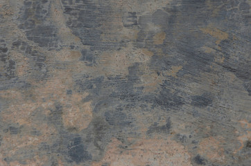 Old cement floor with blurred patterned background