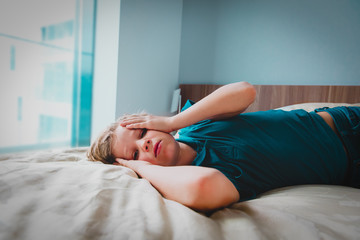 boy feeling anxiety and stress, kid staying home