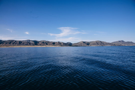 Beautiful Sunny lake and mountains. Photo of the Bukhtarma reservoir in East Kazakhstan
