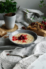 Rice pudding with cinnamon and cherries
